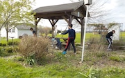 Junior high students from Saint Ambrose School helped with spring clean-up at the Brunswick Area Historical Society’s Heritage Farm as part of the parish community aid weekend.