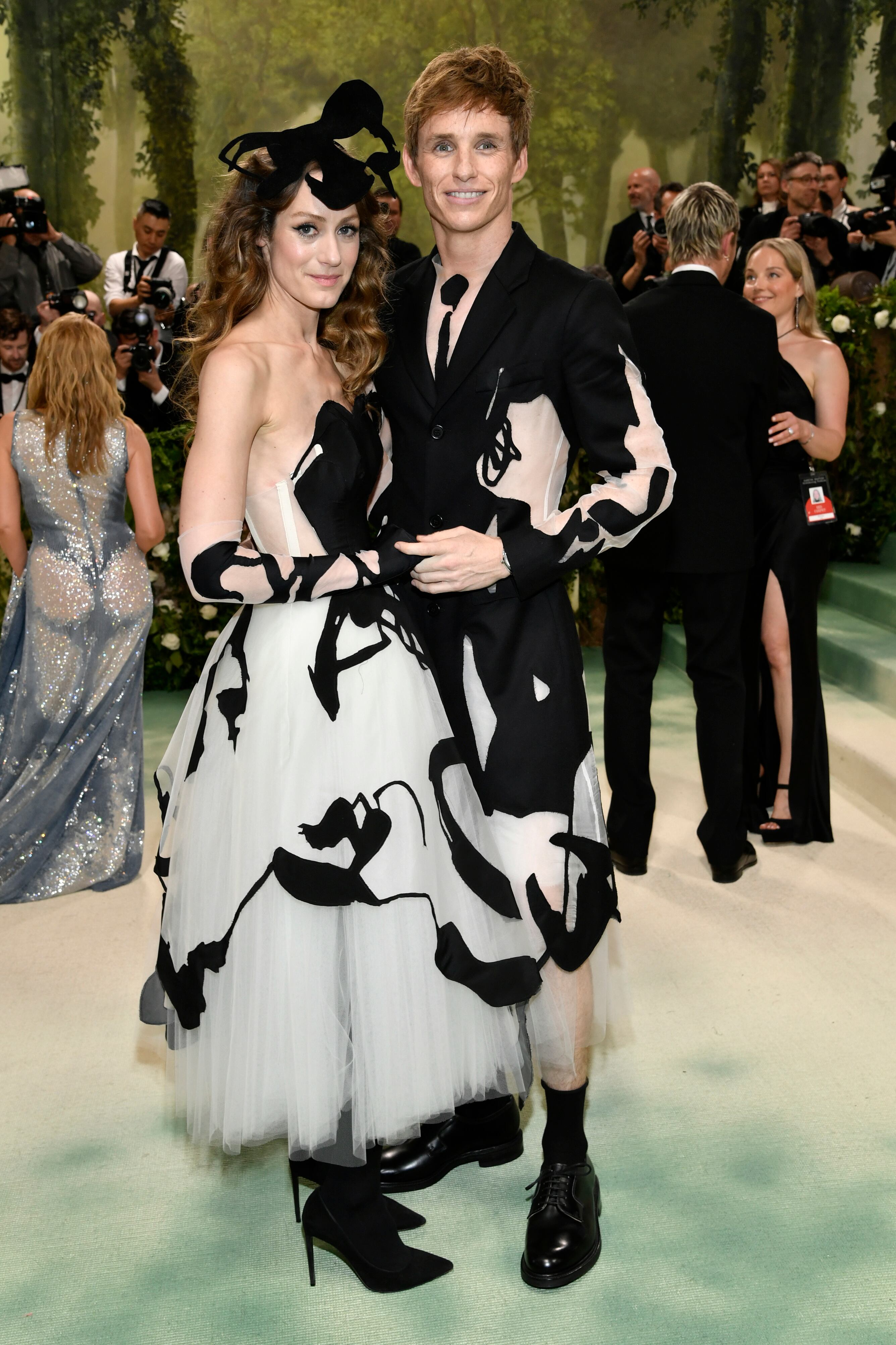 Hannah Bagshawe, left, and Eddie Redmayne attend The Metropolitan Museum of Art's Costume Institute benefit gala celebrating the opening of the 