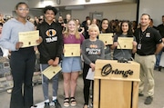 These students helped lead Orange High School’s JustWrite Ohio team to a regional championship and have qualified for the state tournament in May. From left, they are Oriana Arnold, Ishan Bhatt, Sophie Lang, teacher and adviser Kathy Frazier, Mane Sargsyan, Tatev Sargsyan and Principal Jamie Hogue.